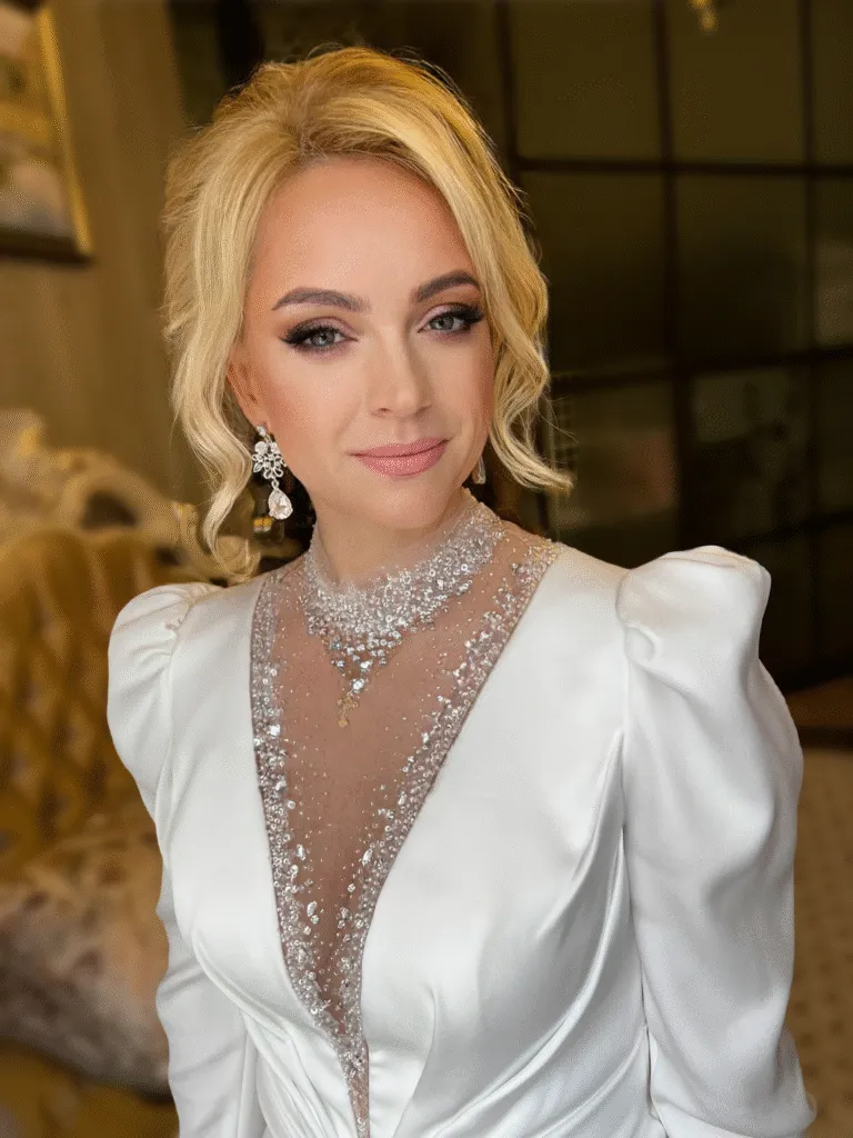 Glamorous bridal makeup and hair with soft smoky eyes and elegant hairstyle by ABC Face in Chicago