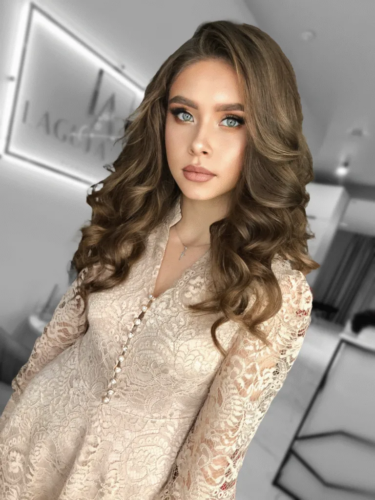 Soft Hollywood waves hairstyle with smooth curls and elegant shine in Chicago