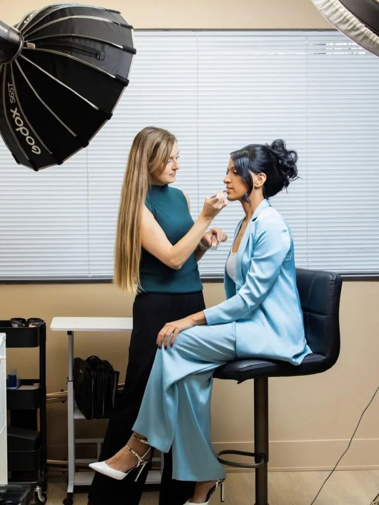 Svetlana Abdela applying makeup for a client in studio