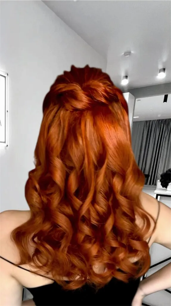 Soft Hollywood waves half-up hairstyle with glossy curls for events and parties in Chicago
