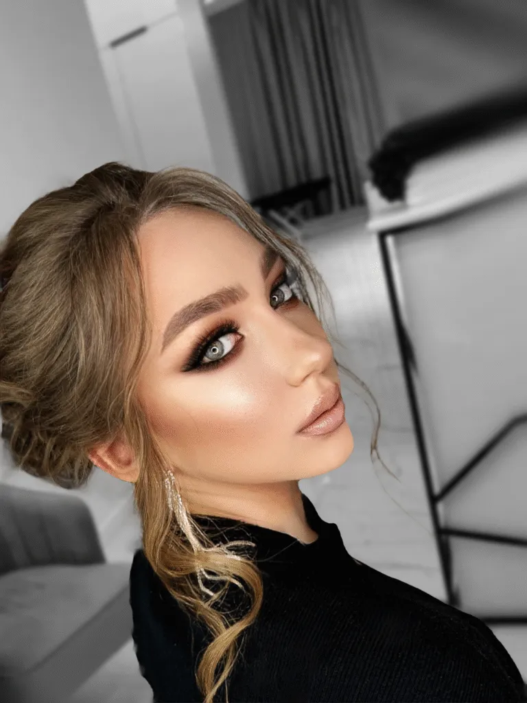 Evening glam event makeup with smokey eyes and radiant skin in Chicago