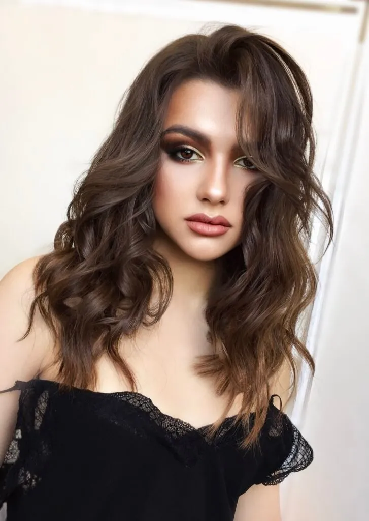 Bronze glow event makeup with warm tones and radiant skin in Chicago