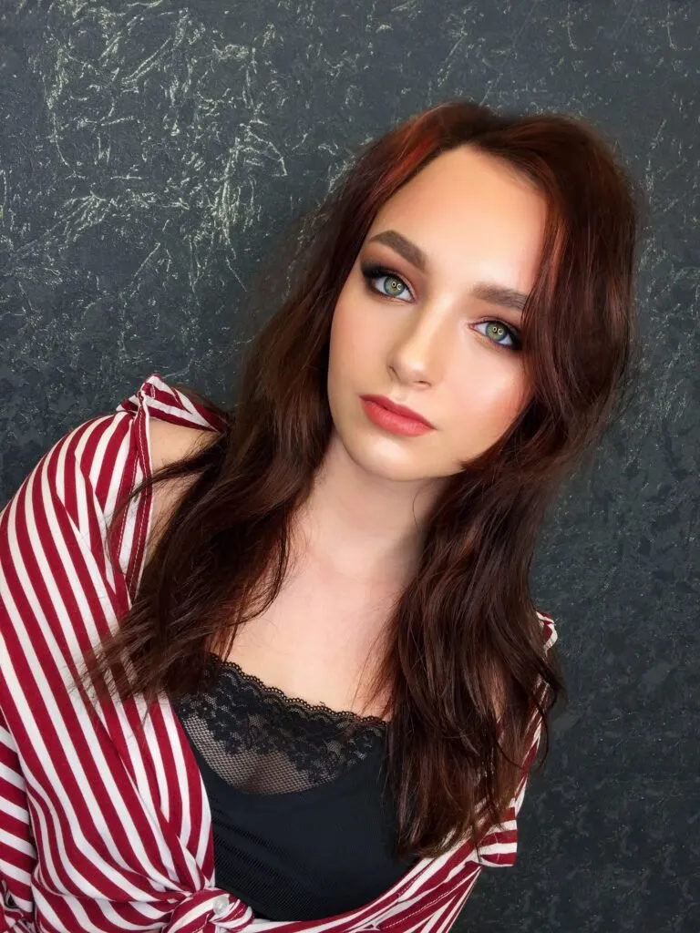 Smokey rose event makeup with glowing skin and soft eye definition in Chicago
