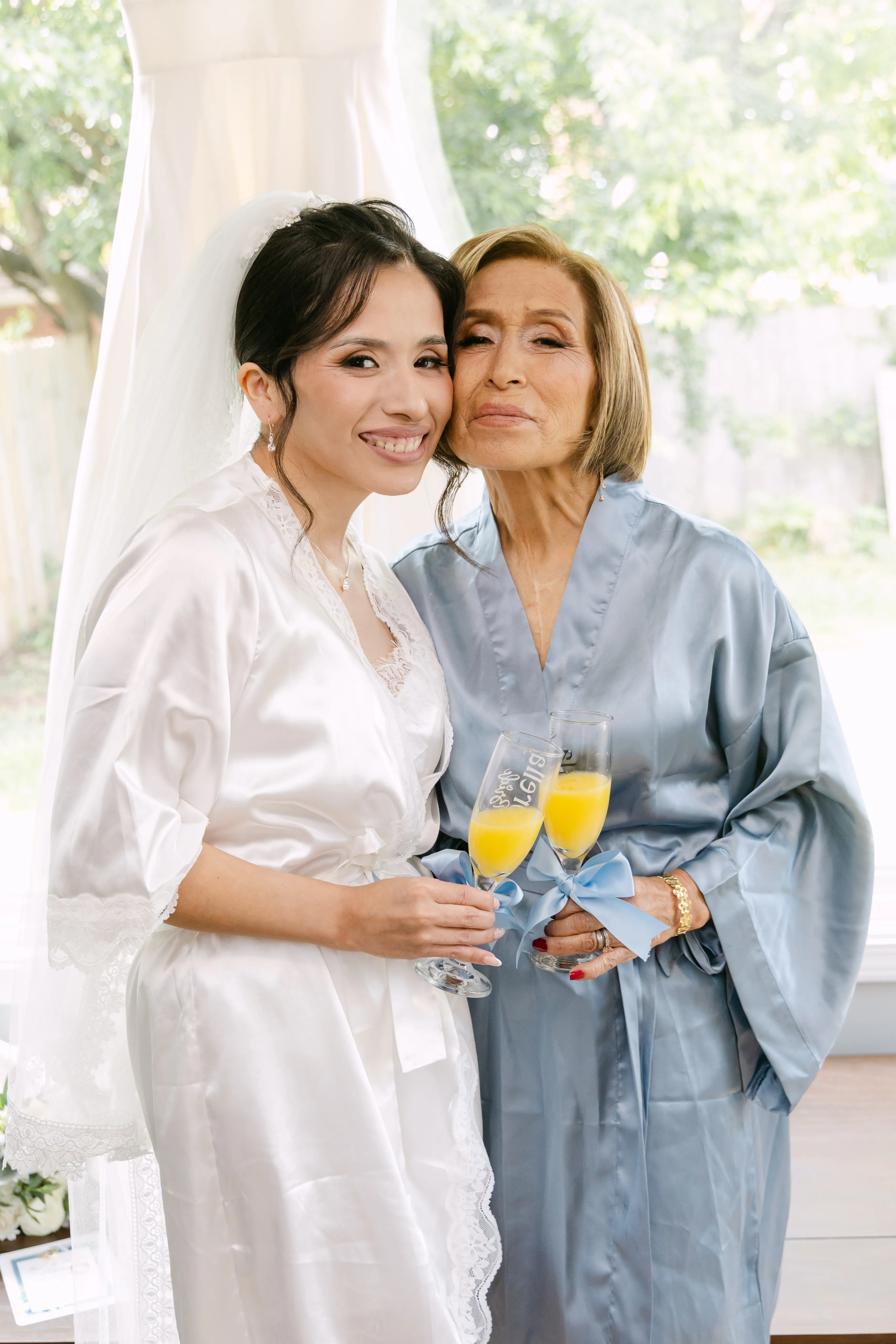 Bride and mother during wedding morning preparations