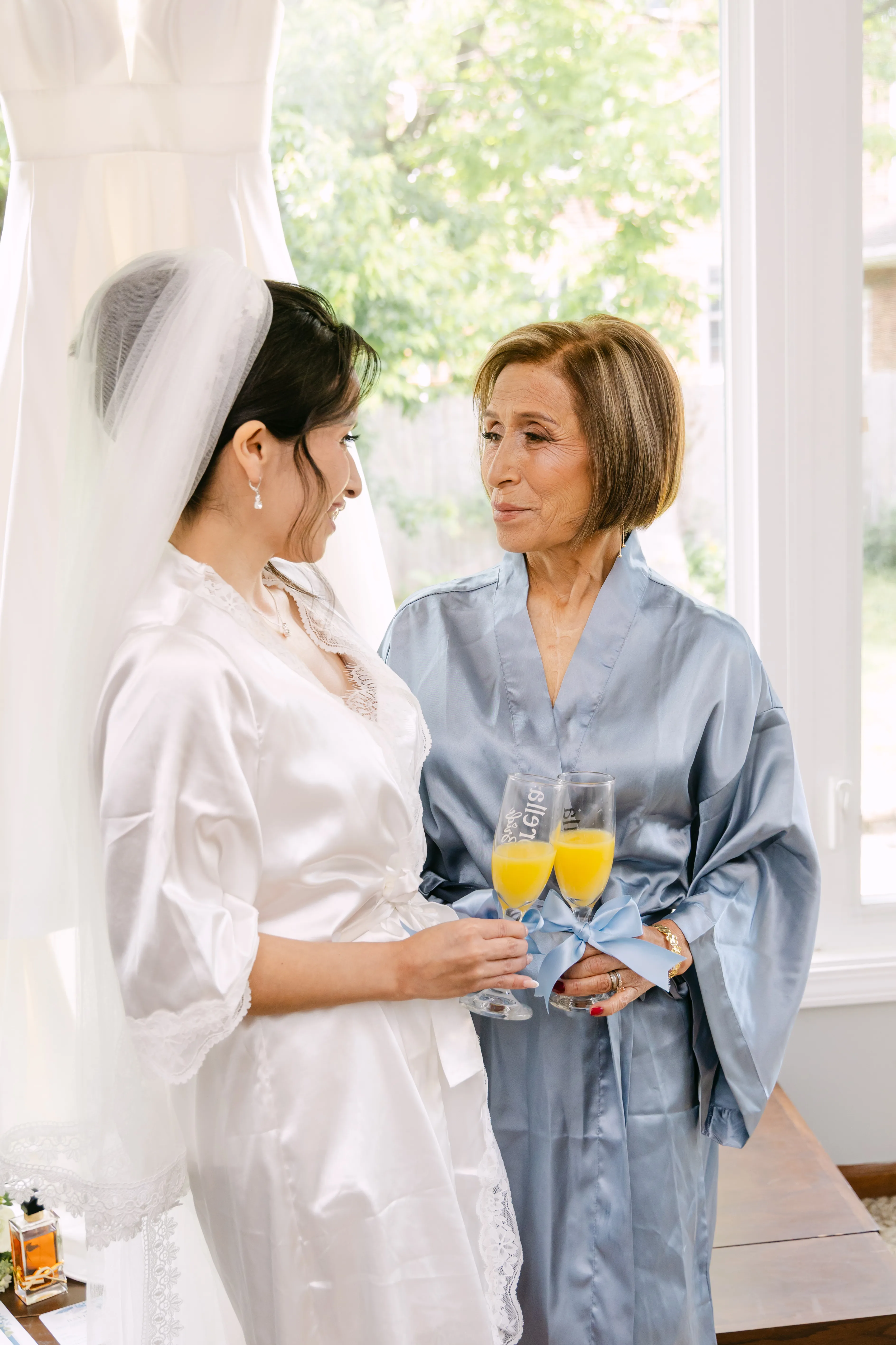 Bride and mother sharing a wedding-day moment