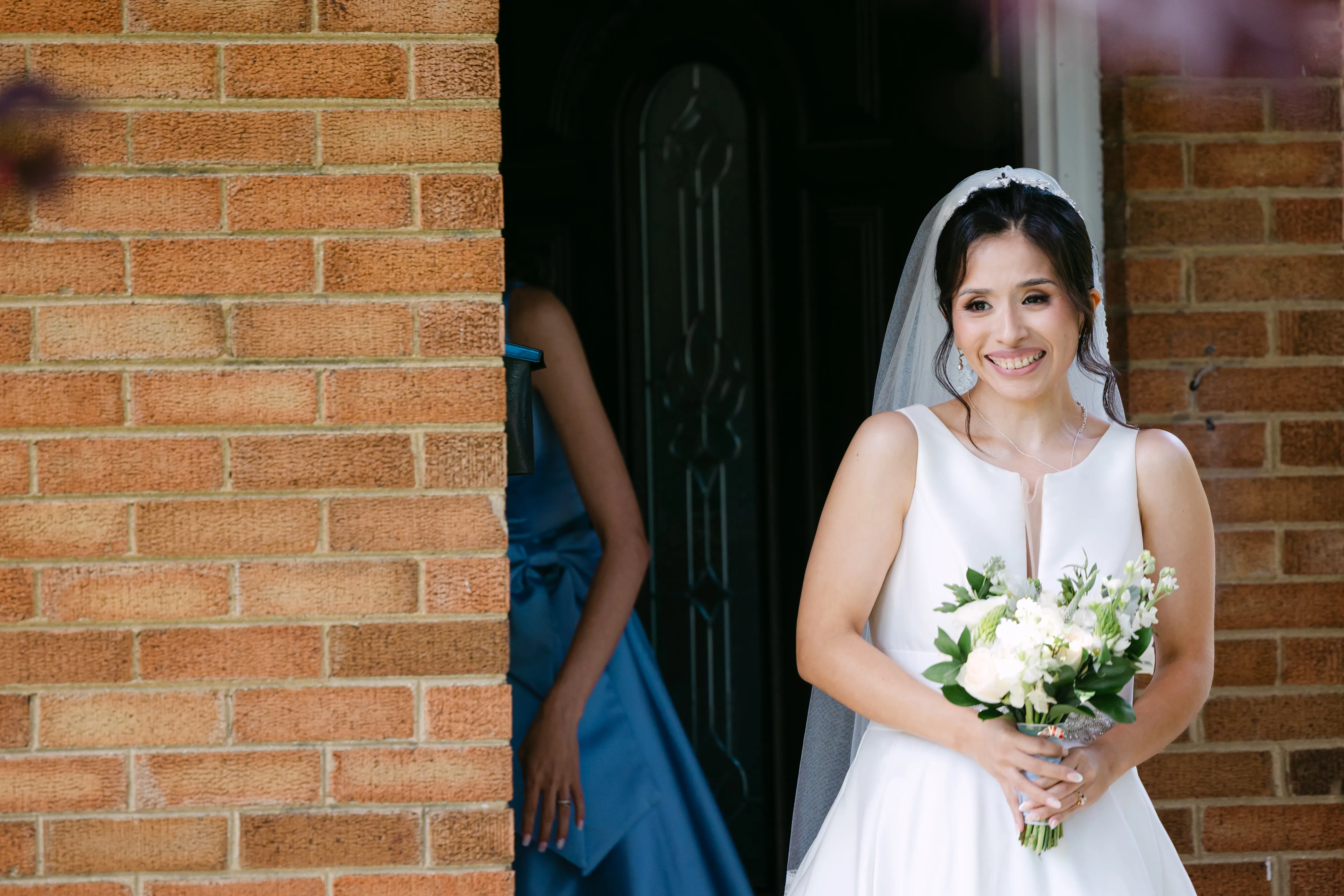 Bride and mother walking together after wedding preparations