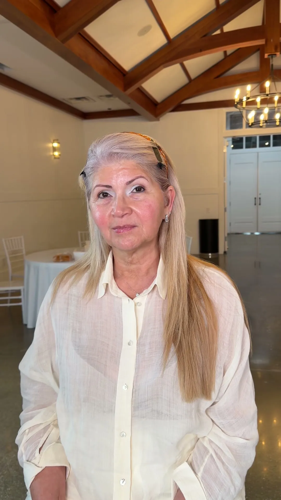 Mother of the bride with fresh makeup and elegant hairstyle